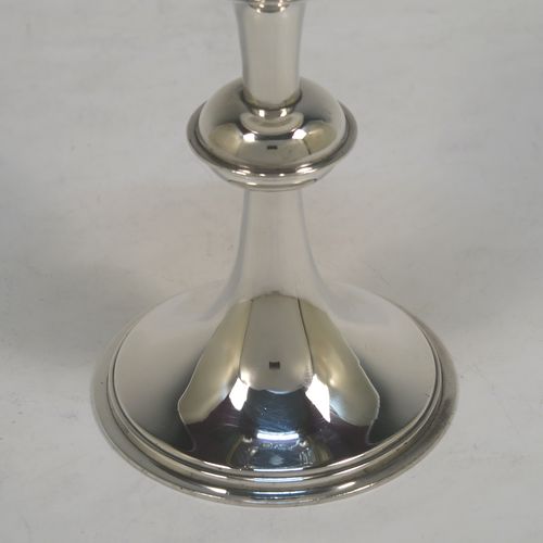 A handsome Antique Victorian Sterling Silver altar chalice, having a plain round tapering cup, a middle plain round stepped baluster, sitting on a round stepped pedestal foot. This beautiful silver chalice was made by Angel and Savory of London in 1894. The dimensions of this fine hand-made antique silver chalice are height 16 cms (6.3 inches), diameter at lip 8 cms (3.25 inches), and it weighs approx. 207g (6.7 troy ounces). Please note that this item has a contemporaneous inscription underneath. 