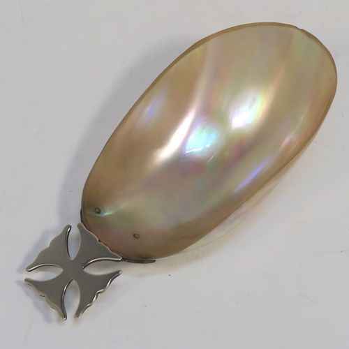 A rare and very pretty Antique Edwardian Sterling Silver and Mother-of-Pearl Anointing or Baptismal holy water Shell, having a silver handle pinned to a shell scoop, all in original very good condition with no damage to the mother-of-pearl. This beautiful baptism or anointing shell was made in London in 1910. The dimensions of this fine hand-made Baptism or Anointing Shell are length 12 cms (4.75 inches), and width 5.5 cms (2.25 inches).  