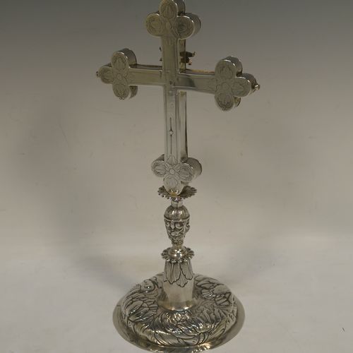 A beautiful Antique early 18th century (possibly late 17th century) continental Sterling Silver altar table cross, showing Christ on the cross and INRI above, with hand-engraved and chased floral decoration. Made in ca 1700 possibly in the city of Breslau (ex-Germany), now Wroclaw (Poland). The dimensions of this fine hand-made antique silver altar cross are height 27 cms (10.75 inches), width 13.5 cms (5.3 inches), with a total weight of approx. 292g (9.4 troy ounces).   