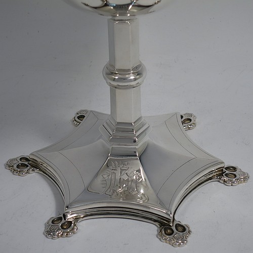 An Antique Victorian Sterling Silver altar chalice, having a plain round bellied cup, a hexagonal column with a middle baluster, and a spreading hexafoil pedestal foot. The chalice made by the Barnard Brothers of London in 1857. The dimensions of this fine hand-made antique silver chalice is height 16.5 cms (6.5 inches) with a total weight of approx. 465g (15 troy ounces). Please note that the chalice is engraved with a christogram.