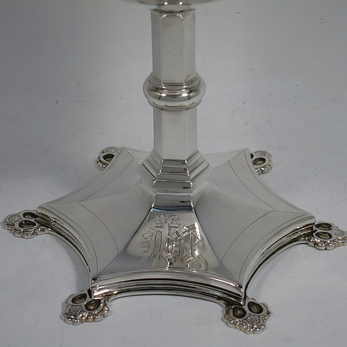 A very handsome Antique Victorian Sterling Silver altar chalice, having a plain round bellied cup, a hexagonal column with a middle baluster, and sitting on a spreading hexafoil pedestal foot. Made by the Barnard Brothers of London in 1857. The dimensions of this fine hand-made antique silver chalice is height 16 cms (6.3 inches), diameter of cup 10 cms (4 inches), and it weighs approx. 328g (10.6 troy ounces). Please note that this item is engraved with a christogram.