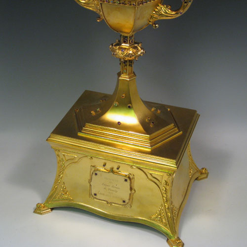 Sterling silver and gold-gilt monstrance for holding the consecrated host, inlaid with semi-precious stones, and all made by Blunt & Wray of London in 1933. Height 70 cms (27.5 inches), depth 21.5 cms (8.5 inches), width 26.5 cms (10.5 inches). Total weight approx. 170 troy ounces (5,270g).