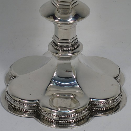 An Antique Victorian Sterling Silver altar chalice, having a plain round bellied cup with a gold-gilt interior, a hexagonal column with middle baluster, and a lobed spreading hexafoil foot with an applied double bead-edged border. Made by George Lambert of London in 1891. The dimensions of this fine hand-made antique silver altar chalice are height 15 cms (6 inches), diameter of cup 7cms (2.75 inches), diameter at base 10 cms (4 inches), and it weighs approx. 274g (8.8 troy ounces).   