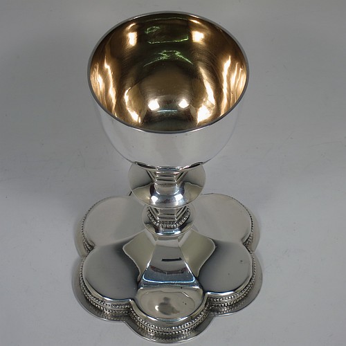 An Antique Victorian Sterling Silver altar chalice, having a plain round bellied cup with a gold-gilt interior, a hexagonal column with middle baluster, and a lobed spreading hexafoil foot with an applied double bead-edged border. Made by George Lambert of London in 1891. The dimensions of this fine hand-made antique silver altar chalice are height 15 cms (6 inches), diameter of cup 7cms (2.75 inches), diameter at base 10 cms (4 inches), and it weighs approx. 274g (8.8 troy ounces).   