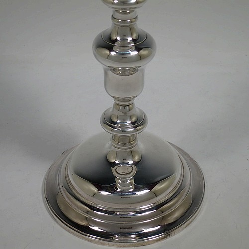 A tall and handsome Antique Victorian Sterling Silver altar chalice, having a plain round bellied cup with a gold-gilt interior, a round multiple baluster column, and sitting on a stepped round pedestal foot. Made by John Samuel Hunt (of Hunt and Roskell the Royal Goldsmiths) of London in 1863. The dimensions of this fine hand-made antique silver altar chalice are height 27.5 cms (10.75 inches), diameter of cup 8.5cms (3.3 inches), diameter at base 13.5 cms (5.25 inches), and it weighs approx. 452g (14.6 troy ounces).    