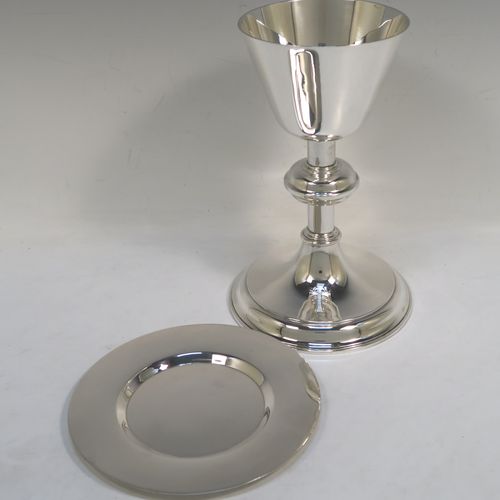 A handsome and large Antique Sterling Silver church altar chalice and paten, having a plain round tapering cup, a middle plain round stepped baluster, sitting on a round stepped pedestal foot, and a matching plain round paten. This elegant antique silver chalice and paten was made by Fredrick Dendy Wray of London in 1913. The dimensions of this fine hand-made antique silver chalice and paten are height of chalice 21 cms (8.25 inches), diameter of paten 15 cms (6 inches), and with a total weight of approx.465g (15 troy ounces).  