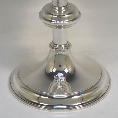 A handsome and large Antique Sterling Silver church altar chalice and paten, having a plain round tapering cup, a middle plain round stepped baluster, sitting on a round stepped pedestal foot, and a matching plain round paten. This elegant antique silver chalice and paten was made by Fredrick Dendy Wray of London in 1913. The dimensions of this fine hand-made antique silver chalice and paten are height of chalice 21 cms (8.25 inches), diameter of paten 15 cms (6 inches), and with a total weight of approx.465g (15 troy ounces).  