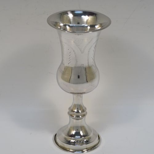 A large and very handsome Sterling Silver beaker, Becher, or Kiddush cup, having a plain round bellied body with hand-engraved stipple floral work, and sitting on a round pedestal foot. This elegant silver Kiddush or Becher beaker was made by Joseph Rosenweig of London in 1918. The dimensions of this fine hand-made silver beaker or Kiddush cup are height 14.5 cms (5.75 inches), diameter at top 6.5 cms (2.5 inches), and it weighs approx. 85g (2.7 troy ounces).   