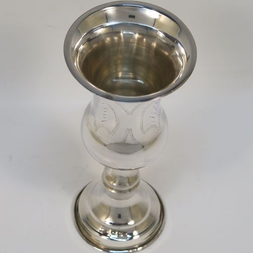 A large and very handsome Sterling Silver beaker, Becher, or Kiddush cup, having a plain round bellied body with hand-engraved stipple floral work, and sitting on a round pedestal foot. This elegant silver Kiddush or Becher beaker was made by Joseph Rosenweig of London in 1918. The dimensions of this fine hand-made silver beaker or Kiddush cup are height 14.5 cms (5.75 inches), diameter at top 6.5 cms (2.5 inches), and it weighs approx. 85g (2.7 troy ounces).   