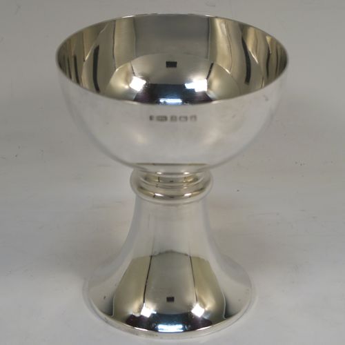 A handsome Antique Sterling Silver altar chalice, having a plain round tapering cup, a middle plain round stepped baluster, sitting on a plain round tapering pedestal foot. This beautiful silver chalice was made by E. S. Barnsley of Birmingham in 1918. The dimensions of this fine hand-made antique silver chalice are height 12.5 cms (5 inches), diameter at lip 10 cms (4 inches), and it weighs approx. 218g (7 troy ounces).   