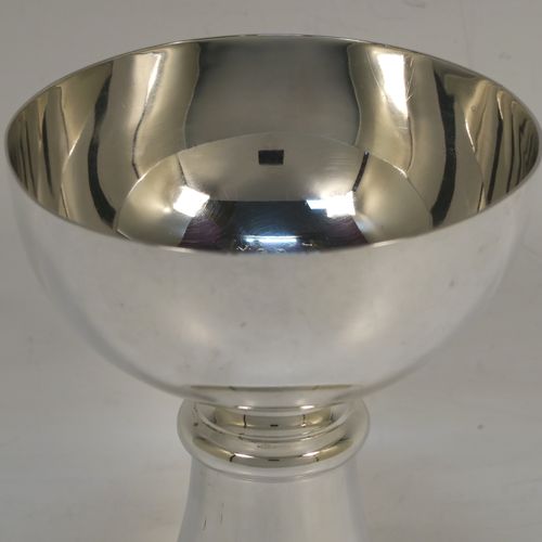 A handsome Antique Sterling Silver altar chalice, having a plain round tapering cup, a middle plain round stepped baluster, sitting on a plain round tapering pedestal foot. This beautiful silver chalice was made by E. S. Barnsley of Birmingham in 1918. The dimensions of this fine hand-made antique silver chalice are height 12.5 cms (5 inches), diameter at lip 10 cms (4 inches), and it weighs approx. 218g (7 troy ounces).   