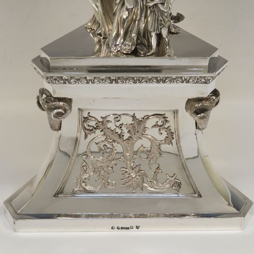 A beautiful and impressive Scottish Antique Victorian Sterling Silver epergne centre-piece, having a top bowl with hand-chased floral, scroll and figural decoration, above a central area consisting of three separate cast caryatid female figures, all sitting on a triangular plinth with tapering sides and applied figural and scroll motifs. This wonderful antique silver centrepiece epergne was made by Marshall and Sons of Edinburgh, Scotland, in 1837. The dimensions of this fine hand-made silver centre-piece are height 47.5 cms (18.75 cms), diameter of bowl 28 cms (11 inches), and it weighs approx. 3,680g (118.7 troy ounces).   