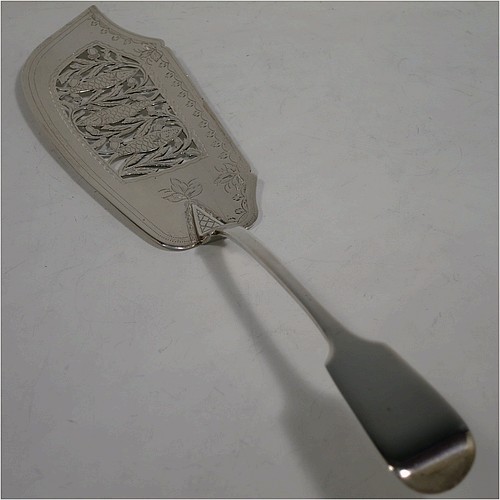 A very pretty and rare Antique Victorian Sterling Silver fish server slice, in the Fiddle pattern with an asymmetrical curved blade, having hand-engraved floral decoration together with hand-pierced fish and acorn work. Made by William Knight of London in 1845. The dimensions of this fine hand-made antique silver fish serving slice are length 30.5 cms (12 inches), and it weighs approx. 112g (3.6 troy ounces).
	   