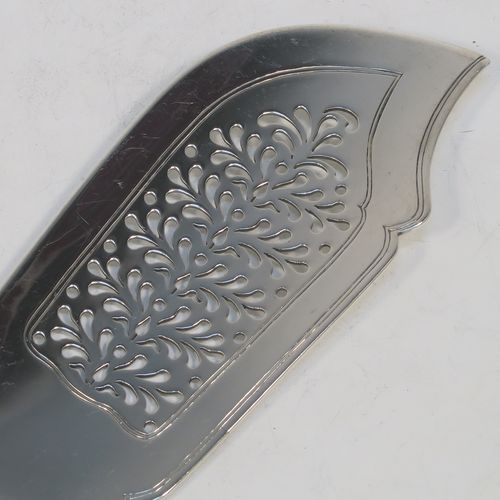 A very pretty Antique Victorian Sterling Silver fish server slice, in the double-struck Bead pattern, with a hand-pierced asymmetrical and curved blade. Made by the Wintle Brothers of Exeter in 1872. The dimensions of this fine hand-made antique silver fish serving slice are length 31 cms (12.25 inches), and it weighs approx. 181g (5.8 troy ounces).  