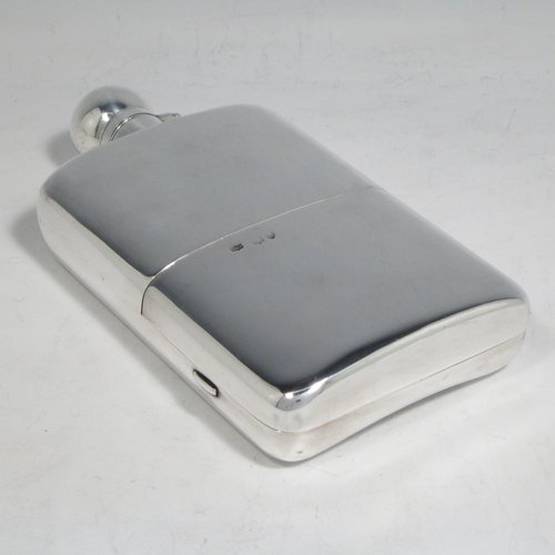 Antique Victorian sterling silver combination whisky hip flask with cigarette case, having a plain shaped rectangular body with rounded shoulders, a bayonet-fit lid, and a hinged side cover with clasp. Made by John Newton Mappin of London in 1893. The dimensions of this fine hand-made silver whisky flask are length 16.5 cms (6.5 inches), width 9 cms (3.5 inches), depth 2.5 cms (1 inch), and it weighs approx. 265g (8.5 troy ounces).  