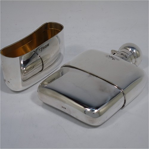 A very handsome Antique Sterling Silver whisky hip flask, having a plain shaped rectangular body with rounded shoulders, a bayonet-fit lid, and a pull-off cup with gold-gilt interior. Made by G. and J. W. Hawksley of Birmingham in 1911. The dimensions of this fine hand-made antique silver whisky flask are length 12 cms (4.75 inches), width 7.5 cms (3 inches), depth 2.5 cms (1 inch), and it weighs approx. 187g (6 troy ounces).   