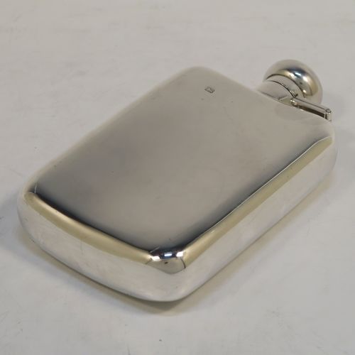 A heavy Sterling Silver whisky hip flask, having a plain shaped rectangular body with rounded shoulders, and a round hinged bayonet-fit lid. This elegant silver whisky flask was made by Robin Pringle of London in 1947. The dimensions of this fine hand-made silver hip whisky flask are length 15 cms (6 inches), width 8.5 cms (3.3 inches), depth 2.5 cms (1 inch), and it weighs approx. 250g (8 troy ounces).  