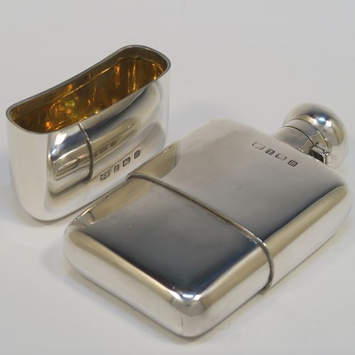 A very handsome Antique Sterling Silver whisky hip flask, having a plain shaped rectangular body with rounded shoulders, a bayonet-fit lid, and a pull-off cup with a gold-gilt interior. This elegant antique silver hip flask was made by Mappin and Webb of Birmingham in 1911. The dimensions of this fine hand-made antique silver whisky flask are length 12.5 cms (5 inches), width 7 cms (2.75 inches), depth 2.5 cms (1 inch), and it weighs approx. 174g (5.6 troy ounces).