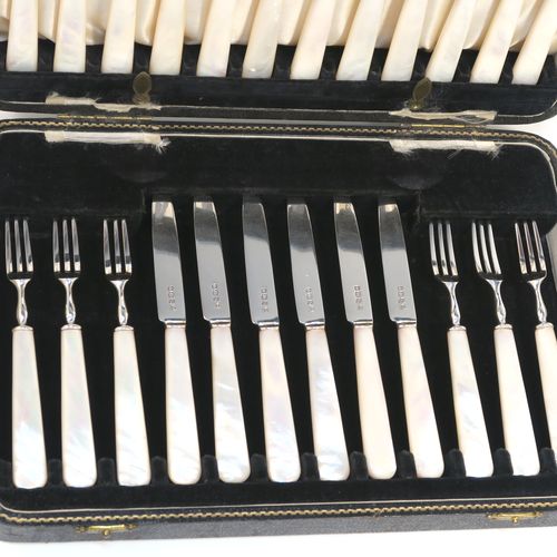 A very elegant Sterling Silver and mother-of-pearl handled fruit set for twelve people. Having plain straight-sided pointed-end blade knives, and three-prong forks. All fitted into an original presentation box with cream satin and black velvet-lined interior. This handsome silver and mother-of-pearl fruit eating set was made by Charles James Allen of Sheffield in 1935. The dimensions of this fine hand-made silver fruit service are length of knife 15 cms (6 inches), and the length of the fork 13.5 cms (5.3 inches).   