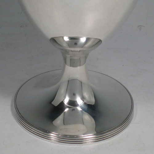 A handsome Antique Victorian Sterling Silver goblet, having a plain round body, sitting on a pedestal foot with a reeded border. Made by Hawksworth, Eyre and Co., of Sheffield in 1853. The dimensions of this fine hand-made antique silver goblet are height 15 cms (6 inches), diameter at lip 9 cms (3.5 inches), and it weighs approx. 197g (6.4 troy ounces).