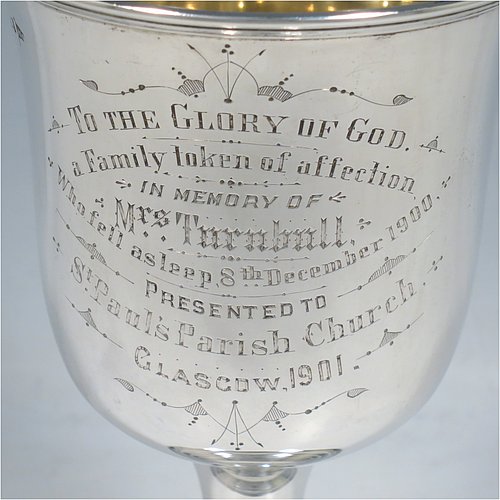 A large Antique Victorian Sterling Silver goblet, having a plain round baluster body with applied reeded border, hand-engraved on one side with a contemporaneous full inscription, a gold-gilt interior, and sitting on a pedestal foot. This handsome silver goblet was made by Walker & Hall of Sheffield in 1901. The dimensions of this fine hand-made antique silver goblet are height 19.5 cms (7.75 inches), diameter at lip 11 cms (4.25 inches), and it weighs approx. 375g (12 troy ounces).   