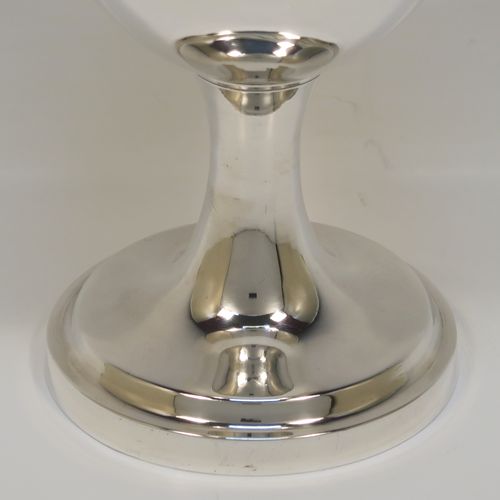 A handsome Antique Georgian Sterling Silver goblet, having a plain round bellied body, sitting on a plain round pedestal foot. This elegant silver goblet was made by Thomas Hobbs of London in 1814. The dimensions of this fine hand-made antique silver goblet are height 15 cms (6 inches), diameter at lip 8.5 cms (3.3 inches), and it weighs approx. 160g (5.2 troy ounces).   