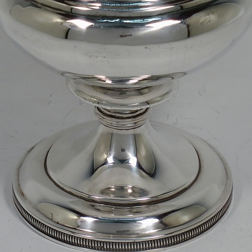 A very handsome Antique Scottish Georgian Sterling Silver wine goblet, having a plain round campania or campagna style bellied body with an applied reeded upper border, a gold-gilt interior, and sitting on a pedestal foot with an applied straight gadroon border. Made by William Jamieson of Edinburgh in 1803. The dimensions of this fine hand-made antique silver campagna or campania style wine goblet are height 15.5 cms (6 inches), diameter at lip 10 cms (4 inches), and it weighs approx. 221g (7 troy ounces).