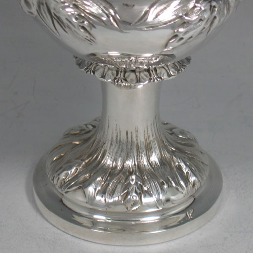 Antique Victorian sterling silver goblet, having a round campagna style body with hand-chased wheat-sheaf decoration, a gold-gilt interior, and sitting on a pedestal foot. Made by George and Charles Fox of London in 1845. The dimensions of this fine hand-made silver goblet are height 15 cms (6 inches), diameter at lip 9 cms (3.5 inches), and it weighs approx. 170g (5.5 troy ounces).
