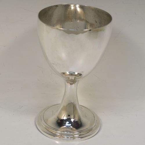 A large and very handsome Antique Georgian Sterling Silver goblet, having a plain round tapering body, sitting on a pedestal foot with a reeded border. This elegant antique silver goblet was made by Robert Scott II of Newcastle in ca. 1800. The dimensions of this fine hand-made antique silver goblet are height 16 cms (6.3 inches), diameter at lip 9.5 cms (3.75 inches), and it weighs approx. 194g (6.3 troy ounces).  