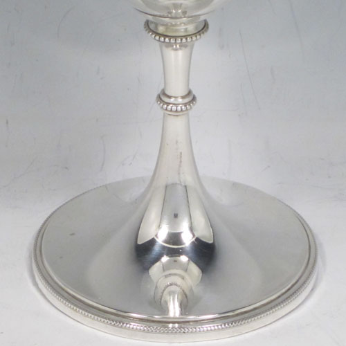 A pretty Antique Victorian Sterling Silver goblet, having a plain round tapering body, and sitting on a pedestal foot with an applied bead border. Made by James Dixon and Sons of Sheffield in 1895. The dimensions of this fine hand-made antique silver goblet are height 17 cms (6.75 inches), diameter at lip 8 cms (3 inches), and it weighs approx. 186g (6 troy ounces).