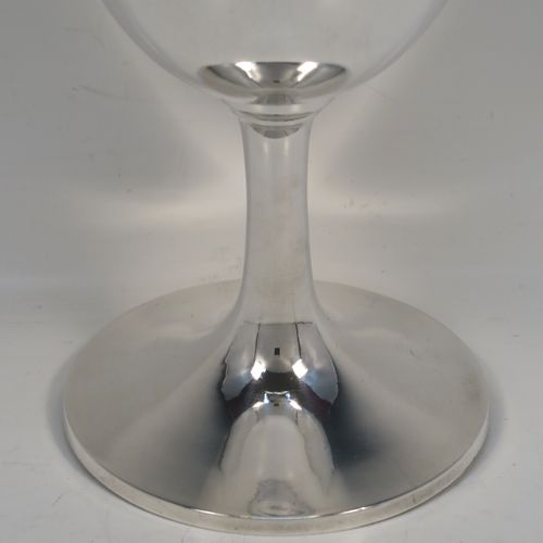 A large and very handsome Antique Georgian Sterling Silver goblet, having a plain round tapering body, sitting on a plain round pedestal foot, and with a reeded top border. This elegant antique silver goblet was made by Hawksworh Eyres and Co., of Sheffield in 1833. The dimensions of this fine hand-made antique silver goblet are height 17 cms (6.75 inches), diameter at lip 9 cms (3.5 inches), and it weighs approx. 258g (8.3 troy ounces).  