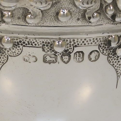 A fantastic Antique Victorian Sterling Silver goblet, having a hand-chased body with bead and floral decoration, a gold-gilt interior, a cast stem with acanthus leaf and bead-work, and sitting on a pedestal foot with a bead-edged border. This beautiful and unique goblet was made by William Edwards of London in 1890. The dimensions of this fine hand-made antique silver goblet are height 16 cms (6.3 inches), diameter at lip 8.5 cms (3.3 inches), and it weighs approx. 188g (6 troy ounces).   