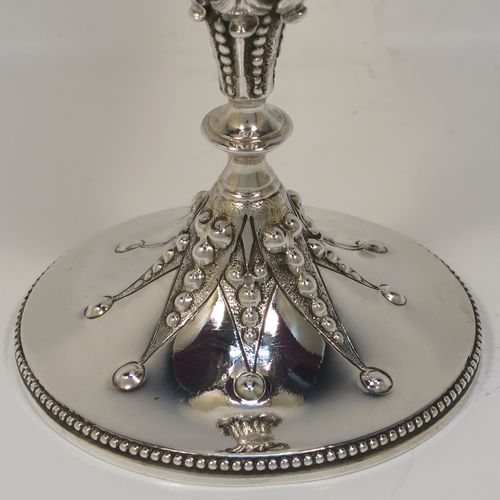 A fantastic Antique Victorian Sterling Silver goblet, having a hand-chased body with bead and floral decoration, a gold-gilt interior, a cast stem with acanthus leaf and bead-work, and sitting on a pedestal foot with a bead-edged border. This beautiful and unique goblet was made by William Edwards of London in 1890. The dimensions of this fine hand-made antique silver goblet are height 16 cms (6.3 inches), diameter at lip 8.5 cms (3.3 inches), and it weighs approx. 188g (6 troy ounces).   