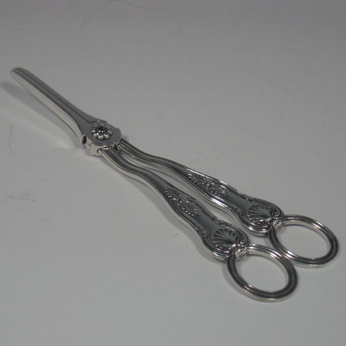    Antique Victorian sterling silver pair of grape shears in the Kings pattern, made by Frances Higgins of London in 1874. Length 19 cms (7.5