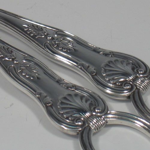    Antique Victorian sterling silver pair of grape shears in the Kings pattern, made by Frances Higgins of London in 1874. Length 19 cms (7.5