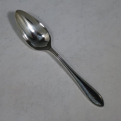 A Sterling Silver set of six grape-fruit spoons, having plain pointed oval bowls, and reeded Sandringham pattern handles, all in original white satin and dark red velvet-lined presentation box. Made by Emile Viner of Sheffield in 1962. The dimensions of these fine hand-made grapefruit spoons are length 14 cms (5.5 inches), and they weigh a total of 185g (6 troy ounces).   