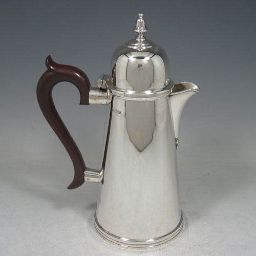 Sterling silver Georgian style straight-sided hot water pot made by J.B. Chatterley & Sons of Birmingham in 1966. Height 24 cms.