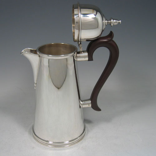 Sterling silver Georgian style straight-sided hot water pot made by J.B. Chatterley & Sons of Birmingham in 1966. Height 24 cms.