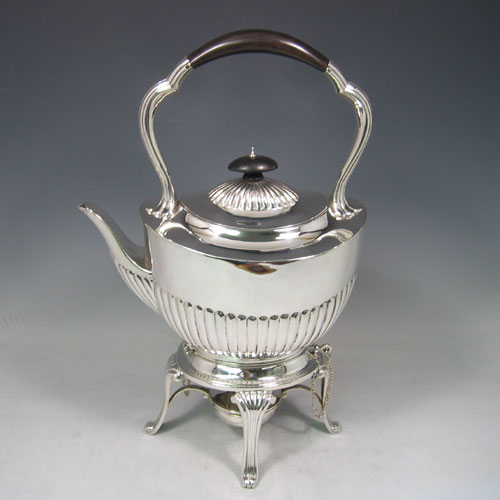 Antique Victorian sterling silver half-fluted kettle on burner and stand made by the Barnard Brothers of London in 1889. Height 36 cms, length 22 cms.