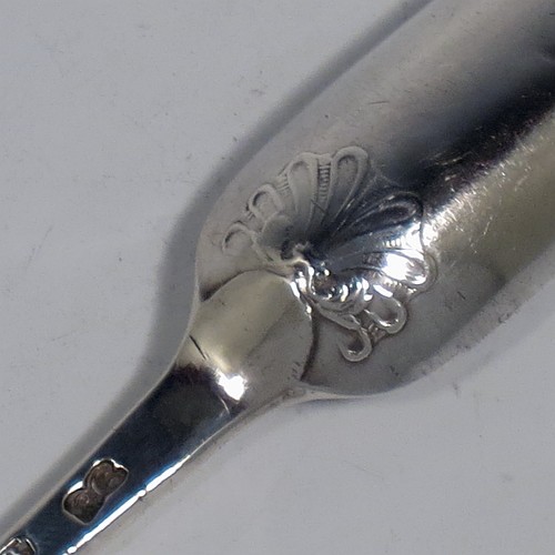 A very handsome Antique Georgian George II Sterling Silver marrow scoop, having a hand-chased shell back above heel on reverse. Made by Ebenezer Coker of London in 1752. The dimensions of this fine hand-made antique silver marrow scoop are length 22 cms (8.75 inches), and it weighs approx. 55g (1.8 troy ounces). Please note that this item is monogrammed.