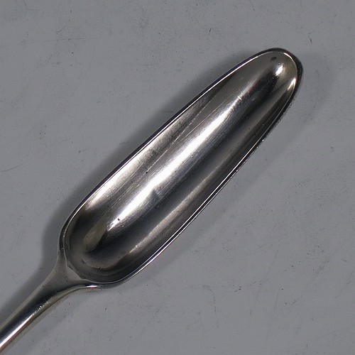 A very handsome Antique Georgian George II Sterling Silver marrow scoop, having a hand-chased shell back above heel on reverse. Made by Ebenezer Coker of London in 1752. The dimensions of this fine hand-made antique silver marrow scoop are length 22 cms (8.75 inches), and it weighs approx. 55g (1.8 troy ounces). Please note that this item is monogrammed.