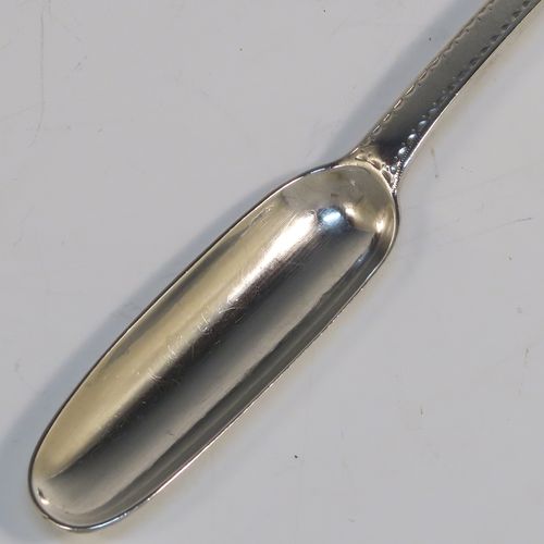 A very elegant Antique Georgian George III Sterling Silver marrow scoop with bright-cut hand-engraved decoration. This handsome antique silver marrow scoop was made by Benjamin Mountigue of London in 1783. The dimensions of this fine hand-made antique silver marrow scoop are length 22 cms (8.5 inches), and it weighs approx. 49g (1.6 troy ounces).

  