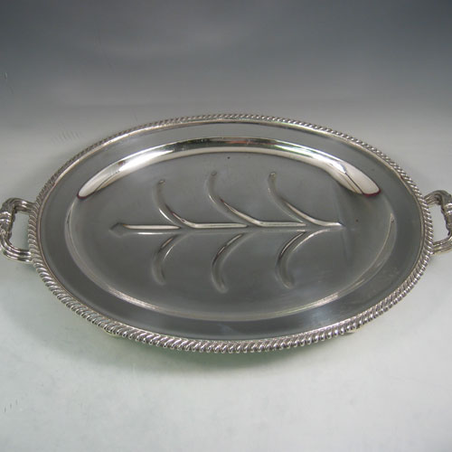    Antique Georgian Old Sheffield silver plated meat cover and 'well & tree' platter with warming jacket. All made in ca. 1810. Length 53 cms, width 35 cms.