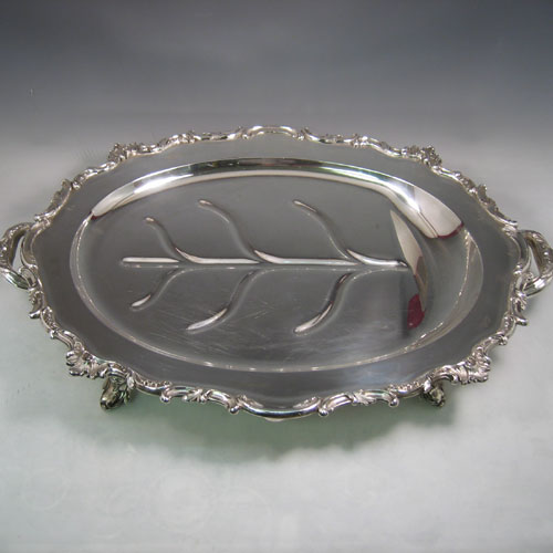 Antique Georgian Old Sheffield silver plated melon-style meat cover and well and tree platter with warming jacket. (Crested). All made in ca. 1820. Length 67 cms, width 45 cms.