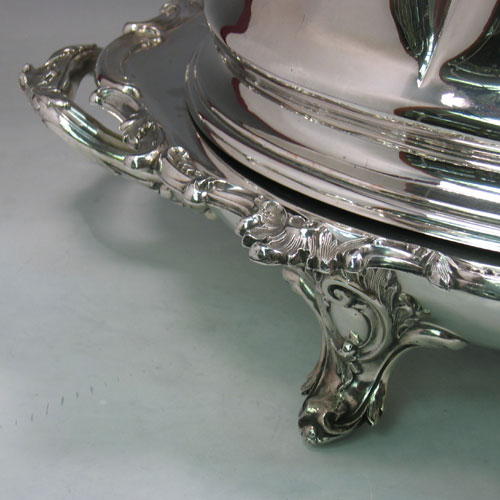 Antique Georgian Old Sheffield silver plated melon-style meat cover and well and tree platter with warming jacket. (Crested). All made in ca. 1820. Length 67 cms, width 45 cms.