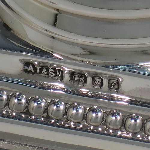 A rare and large Sterling Silver Hanukkah Menorah in a traditional Corinthian style, having a panelled and fluted column, sitting on a stepped base with bead borders. Made by Alexander Titlebaum of London in 1961. The dimensions of this fine hand-made silver menorah are height 46 cms (18 inches), spread across arms 26 cms (10.25 inches), and it weighs approx. 824g (26.5 troy ounces) Please note that this item is NOT filled so the whole weight is silver.    