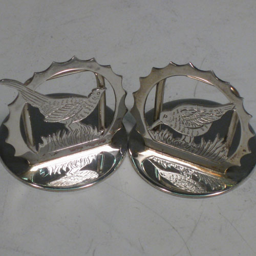 Sterling silver set of six place card holders with a hunting and shooting theme. Each one having a different animal including a retriever dog, pheasant, snipe, duck, partridge, and stag, and all in their original satin and velvet-lined presentation box. Made in London in 2000. Diameter of bases 3 cms (1.3 inches). Total weight approx. 79g (2.5 troy ounces).