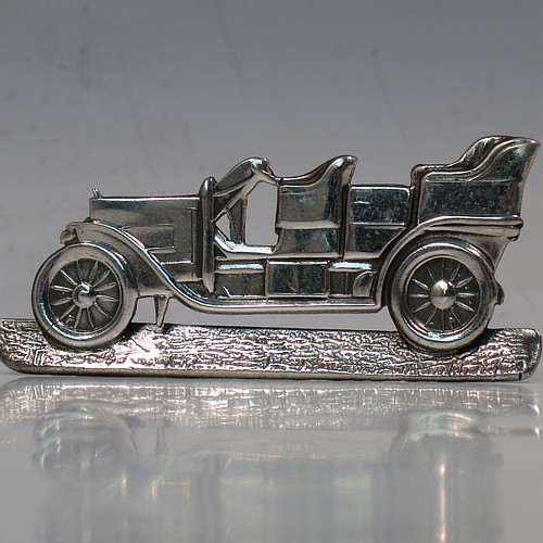 A very rare Antique Edwardian Sterling Silver set of twelve place card or menu card holders, having bodies in the shape of vintage motor cars, each mounted on a base with a semi-circular wire foot and slots for menus or place-cards. Made in Birmingham in 1907. The dimensions of this fine set of antique silver menu or place card holders are length 6.5 cms (2.5 inches), height 3 cms (1.2 inches), depth 3cms (1.2 inches), and they weigh a total of approx. 221g (7 troy ounces).   