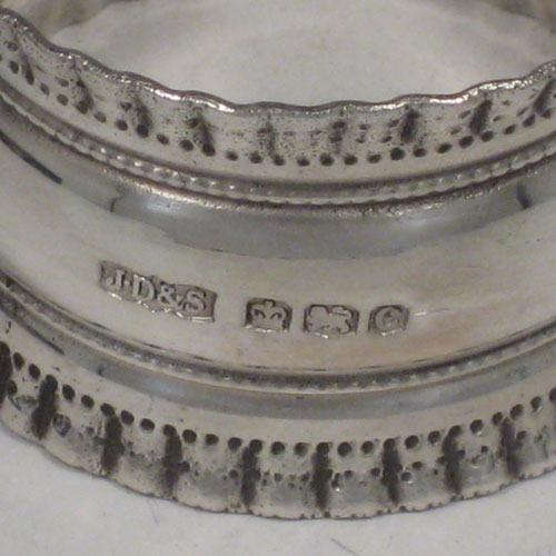 A very pretty Antique Sterling Silver set of twelve napkin, in their original satin and velvet-lined presentation box. These beautiful silver were made by James Dixon & Sons of Sheffield in 1920. The dimensions of each silver napkin ring: diameter 4 cms (1.5 inches), height 2.5 cms (1 inch). Weight approx. 12 troy ounces (372g).