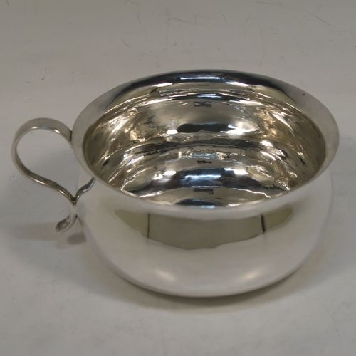 A very unusual Antique Victorian Sterling Silver copy of a bedchamber pot, having a plain bellied body, and a scroll side-handle. This handsome antique silver bedchamber pot bowl was made by Lamberts of London in 1890. The dimensions of this fine hand-made antique silver chamber pot are diameter 11 cms (4.25 inches), height 6 cms (2.3 inches), and it weighs approx. 140g (4.5 troy ounces).  